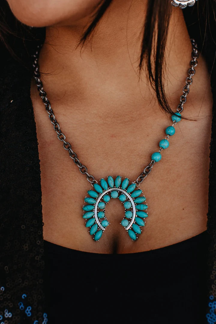 TELL ME ABOUT IT SILVER AND TURQUOISE SQUASH BLOSSOM NECKLACE